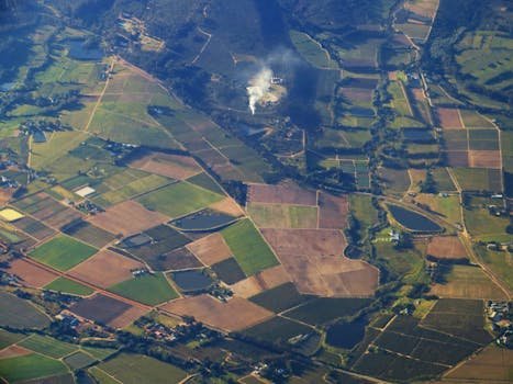 pexels-photo-636342-636342 Aerial landscape of diverse farmlands and countryside near Cape Town, showcasing agricultural patterns.